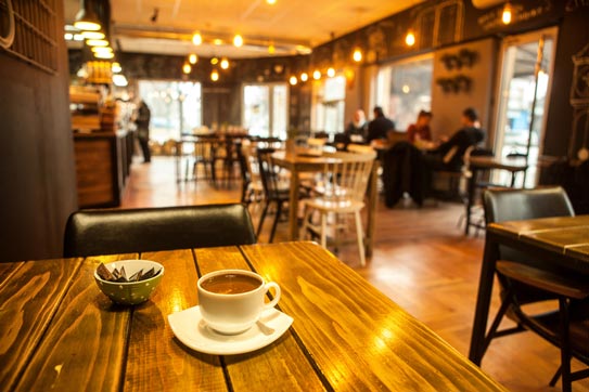 Cafetería regular Coffe QO - ambiente acogedor